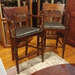Pair Anglo Indian Teak and Leather Barstools