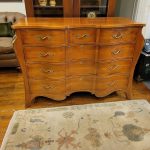 C. 1820, French Cherry Double Serpentine Bombe Chest.