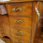 C. 1820, French Cherry Double Serpentine Bombe Chest.