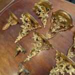 Assemblage of 7 Pairs of Gilded Sconces