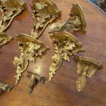Assemblage of 7 Pairs of Gilded Sconces