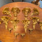Assemblage of 7 Pairs of Gilded Sconces